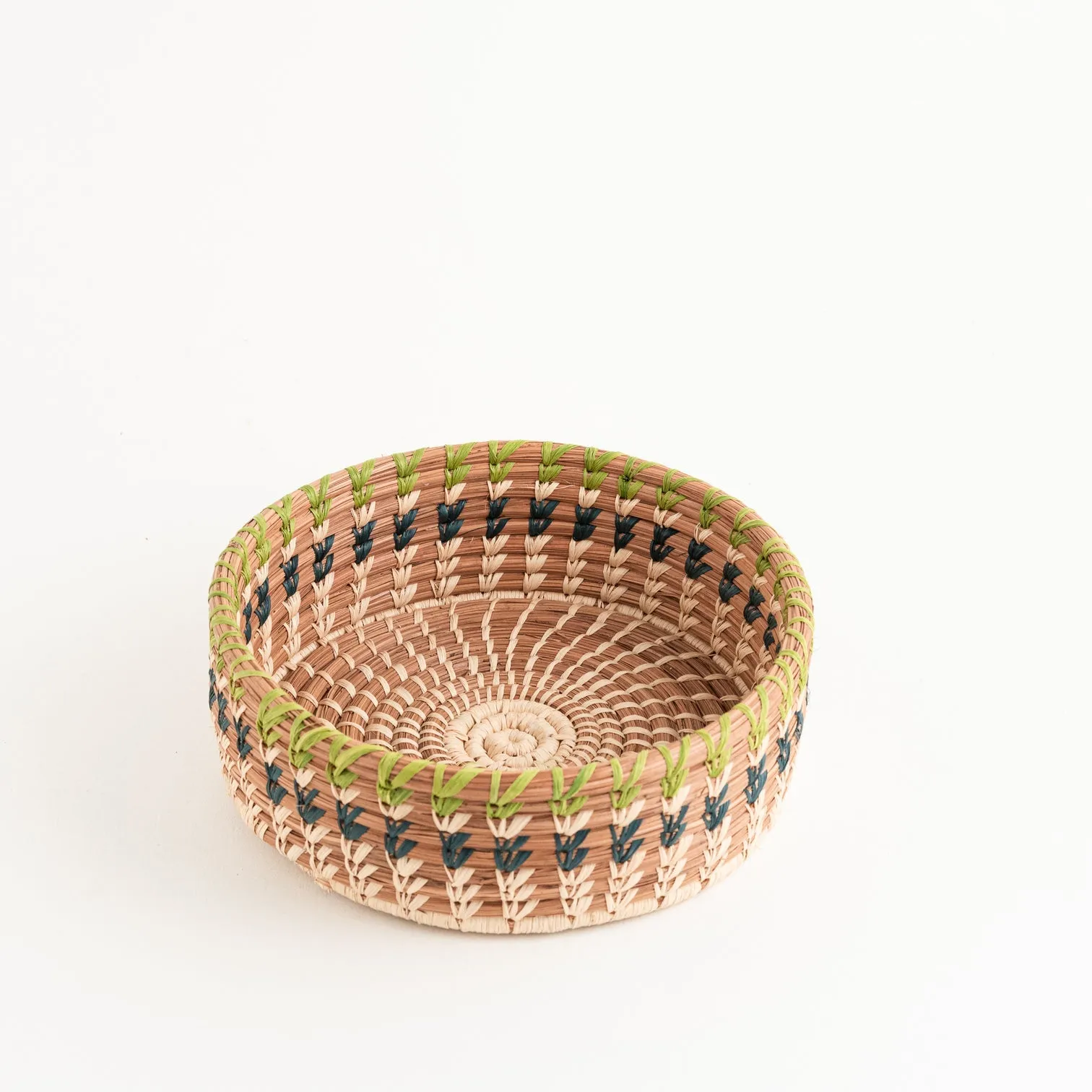 Basket made of pine needle and raffia