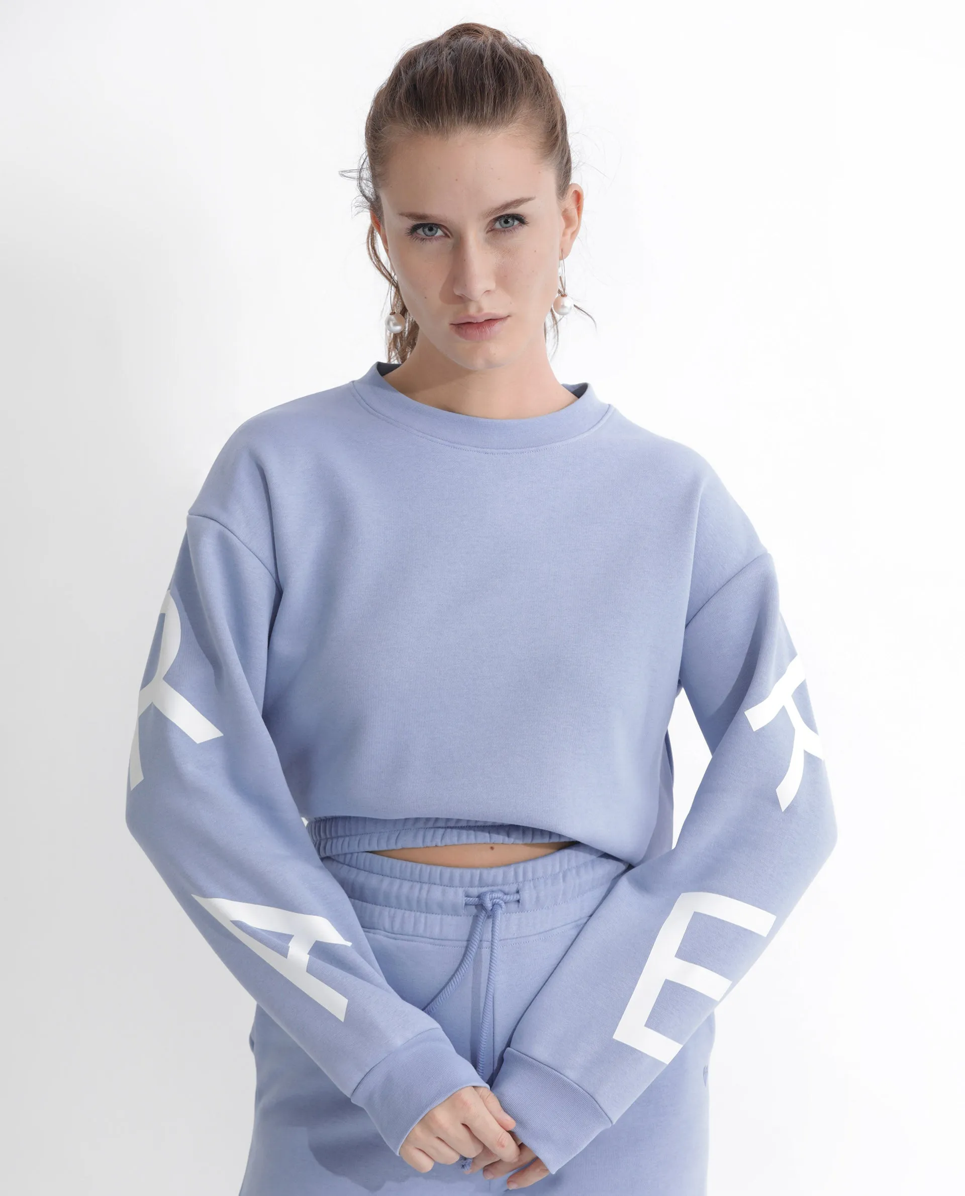 Rareism Articale Women Jonice Light Blue Poly Cotton Fabric Full Sleeves Crew Neck Regular Fit Graphic Print Cropped Sweatshirt