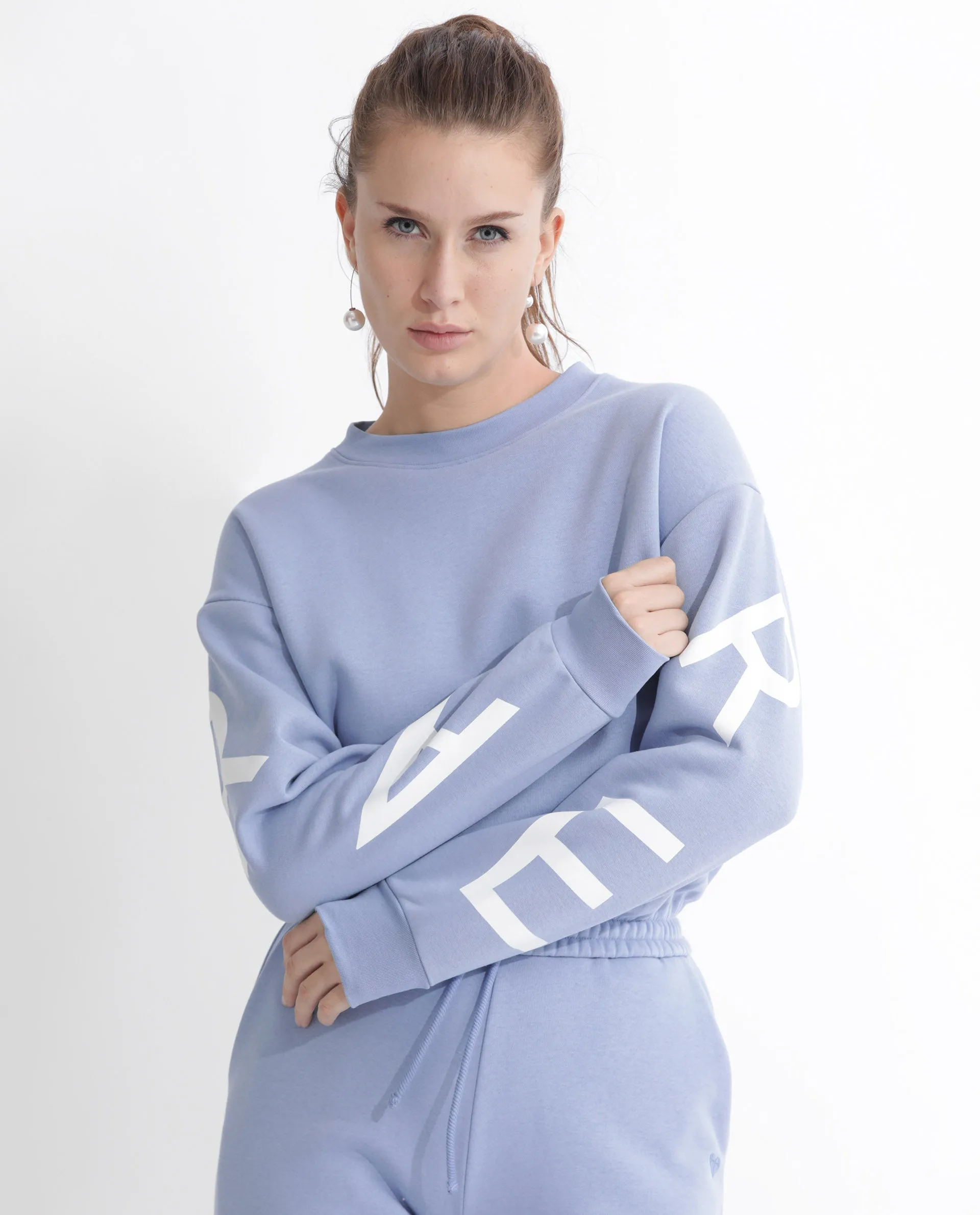 Rareism Articale Women Jonice Light Blue Poly Cotton Fabric Full Sleeves Crew Neck Regular Fit Graphic Print Cropped Sweatshirt