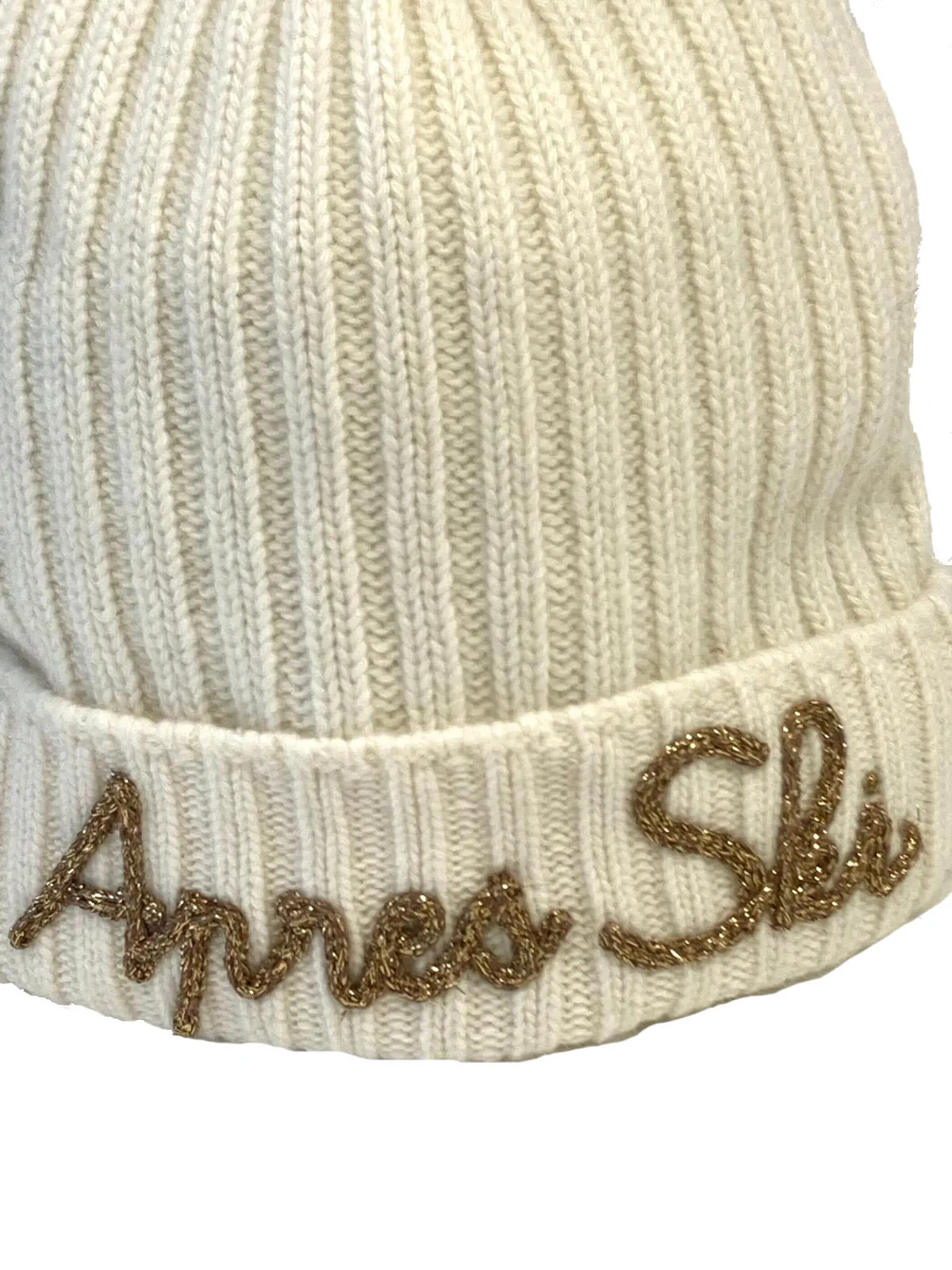 White embroidered women's ski beanies with pom poms.