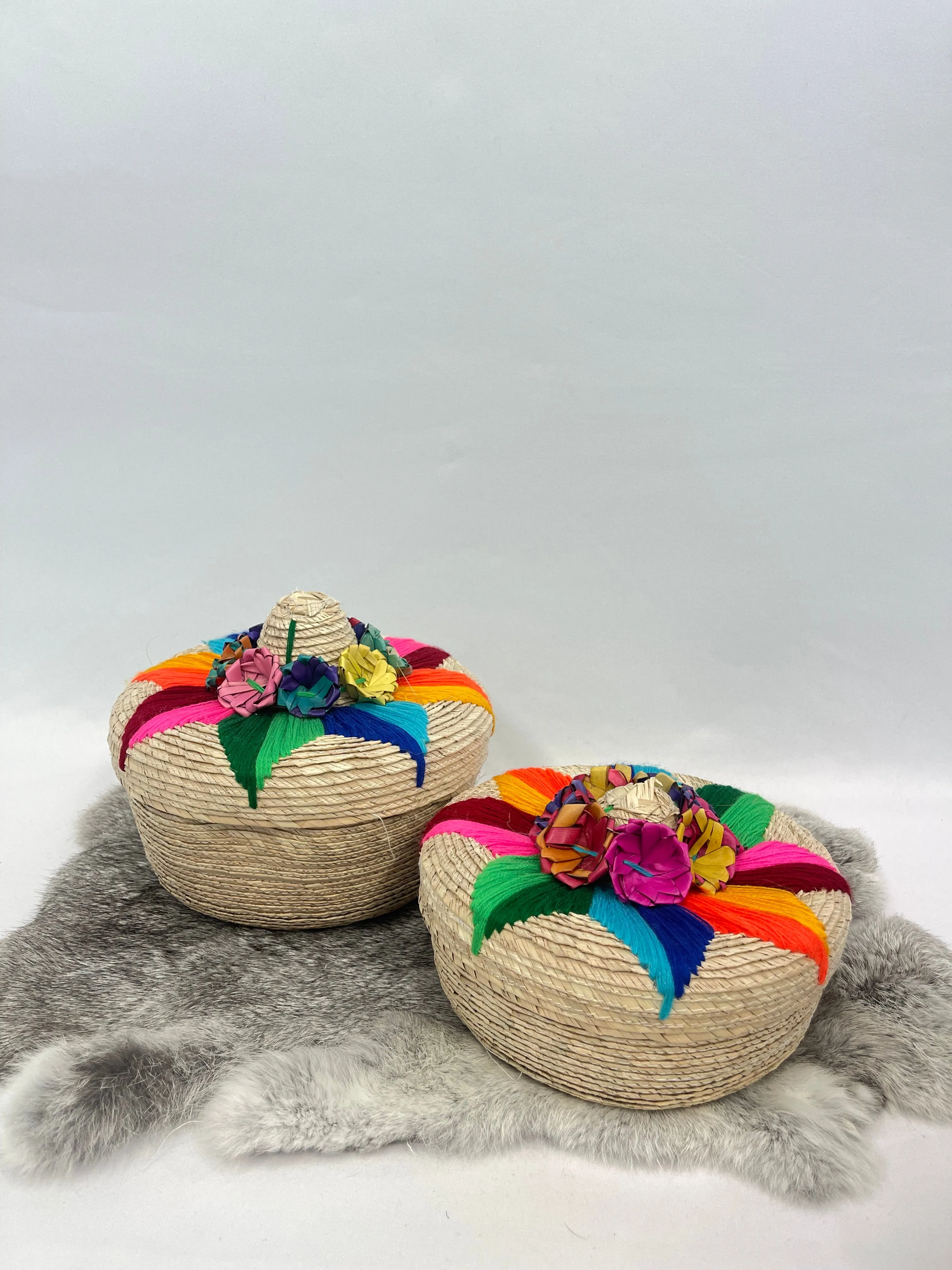 Woven striped baskets with lids