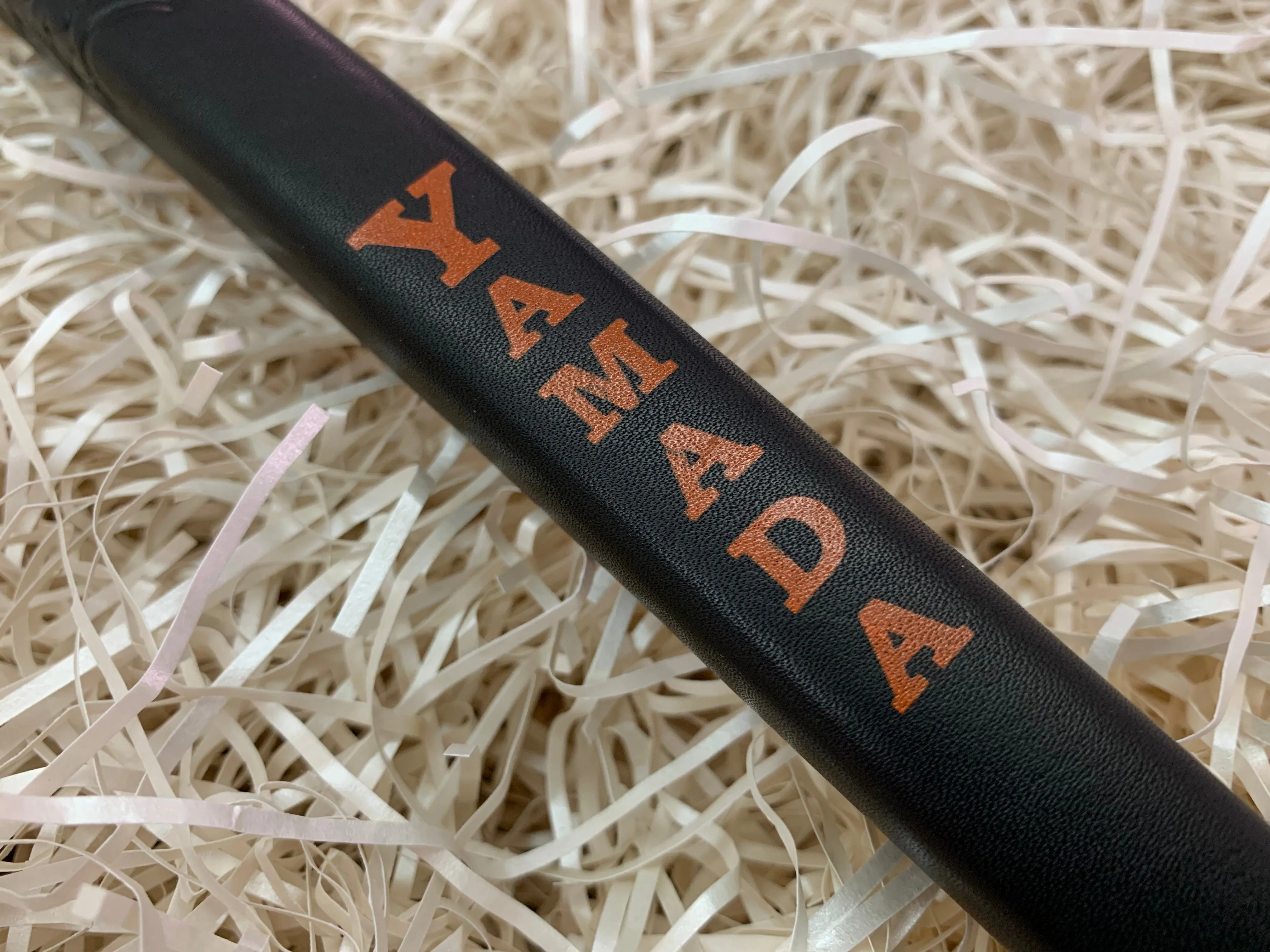 Yamada Putter Grip Leather - Standard Size - Black with Orange Letters.